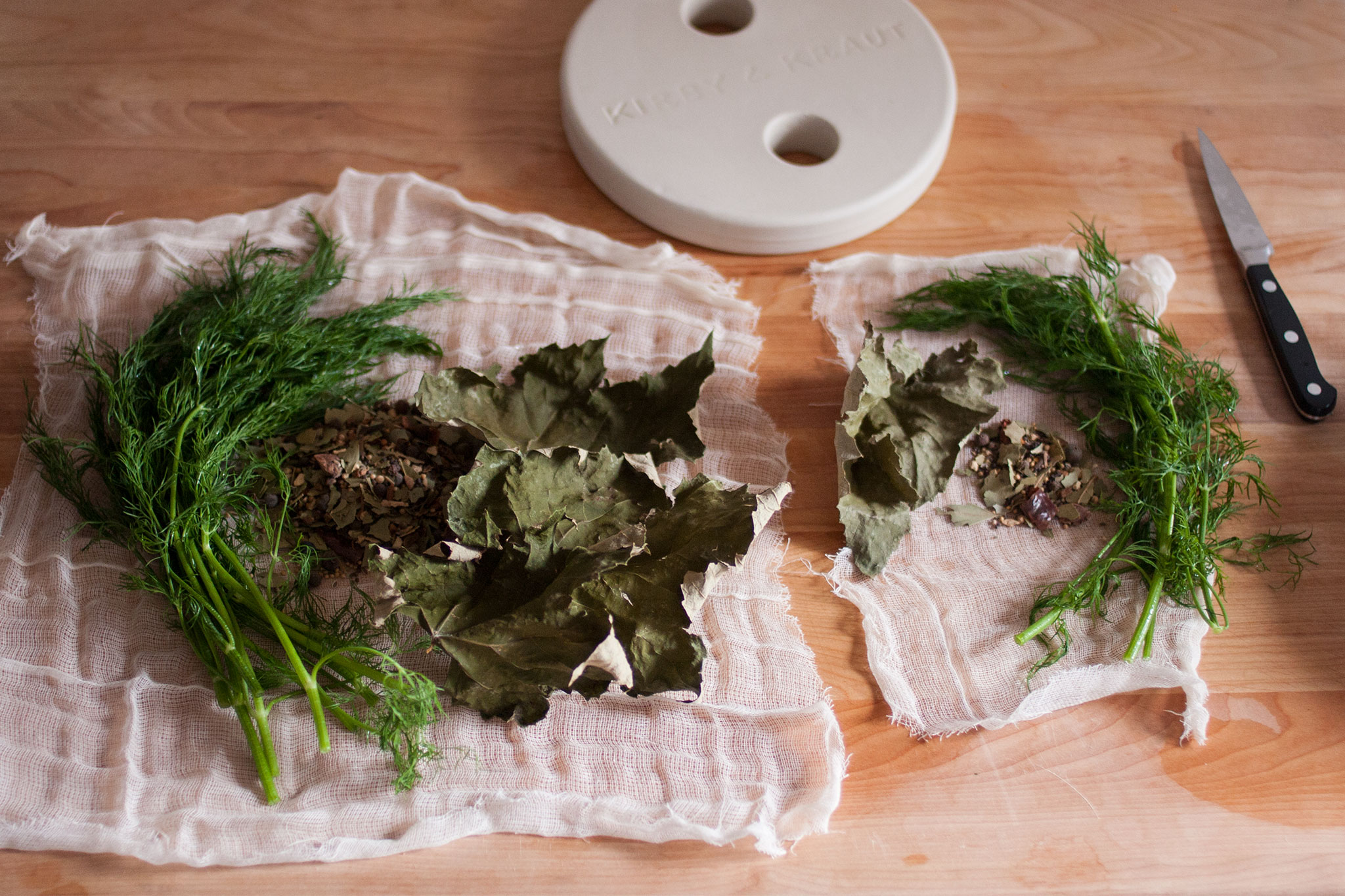 Measuring the spices into cheesecloth Kirby & Kraut