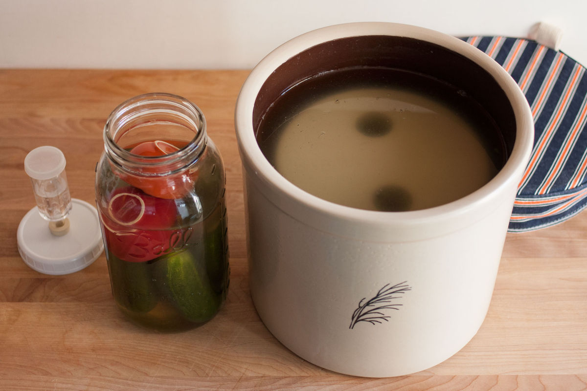 Pickles in a jar and a crock