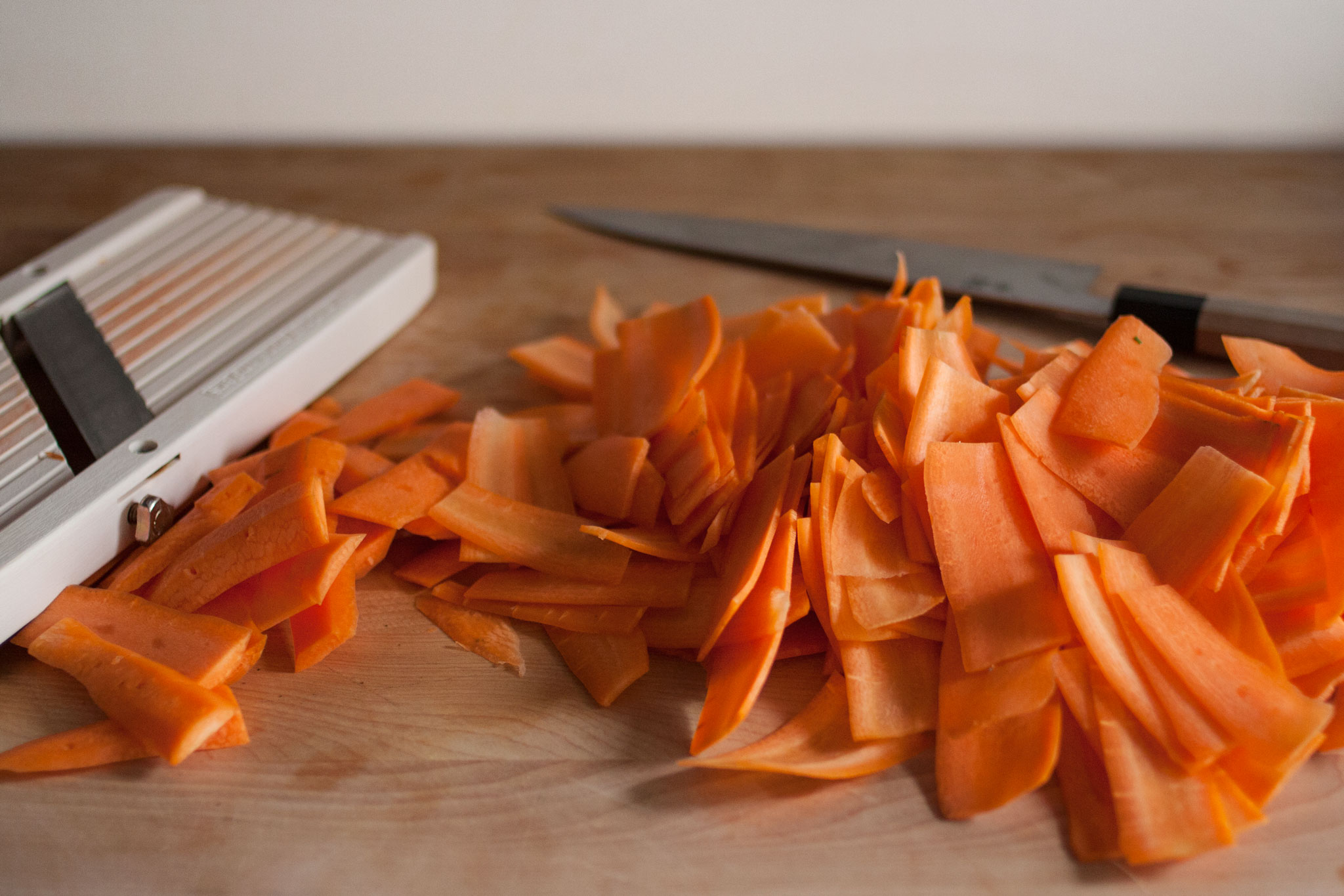 Slicing carrots on a mandoline Kirby & Kraut